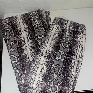 Trendy snake flare pants